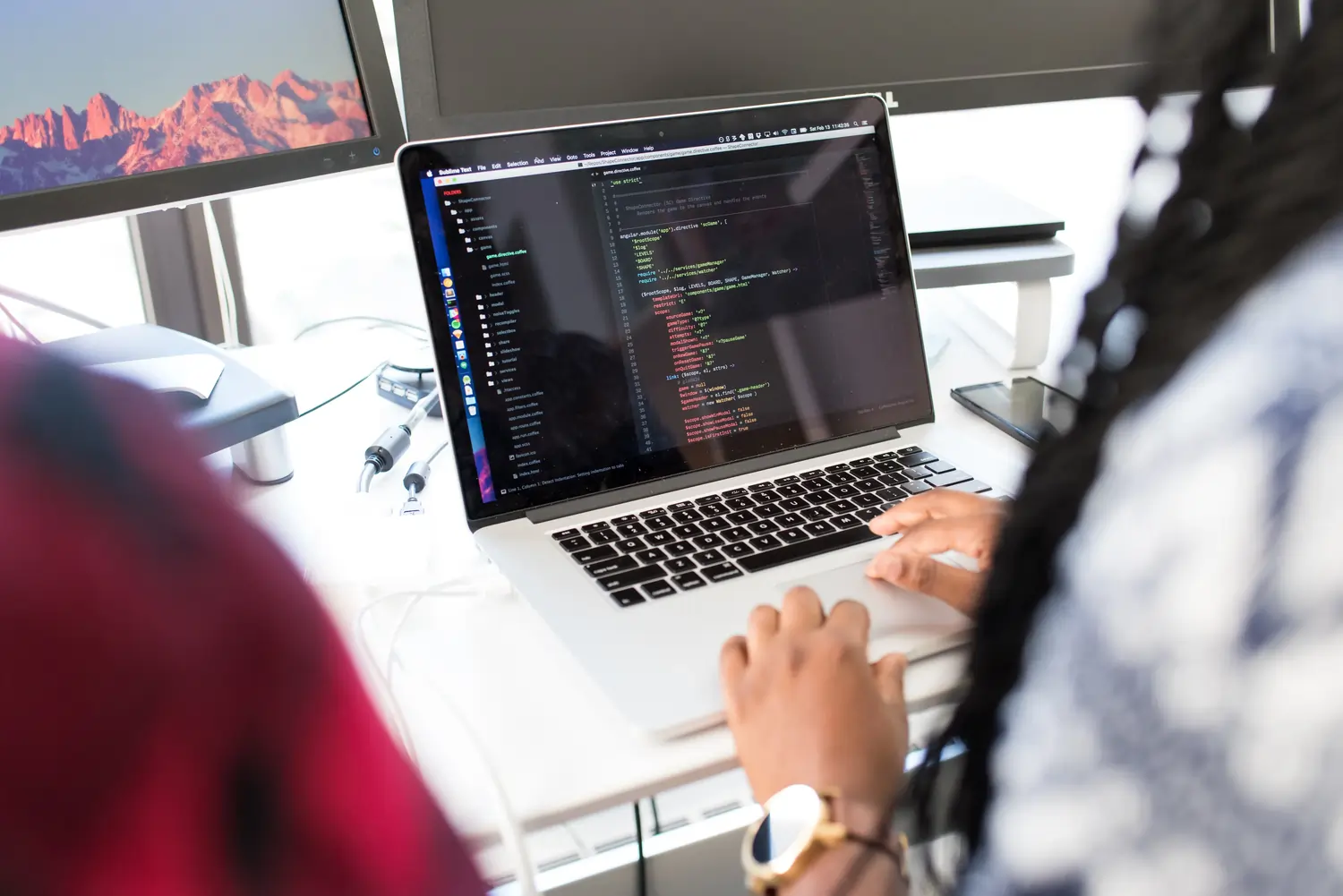 Images showing a guitar, a developer coding, a mosque in Tunisia, a coffee and an astronaut in the desert